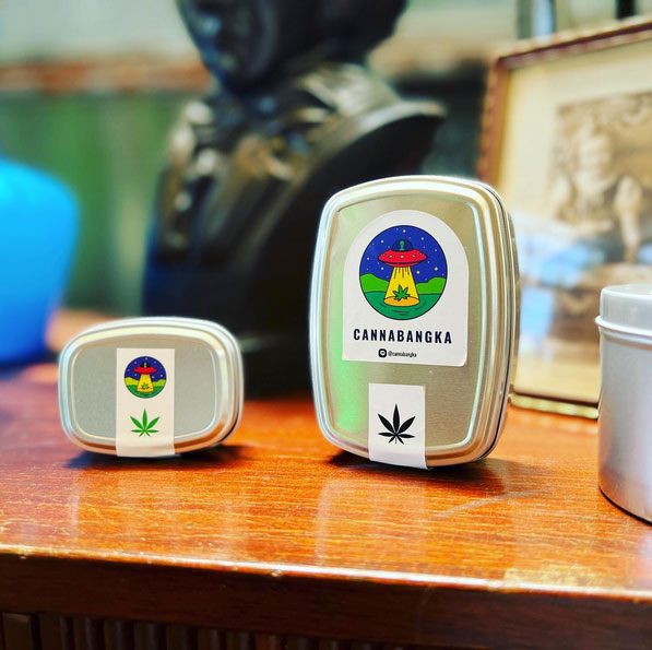 metal tins with cannabis