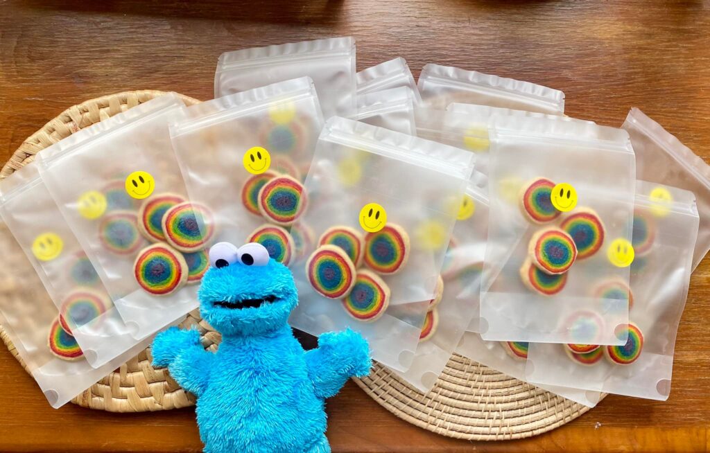 blue elmo in front of edibles