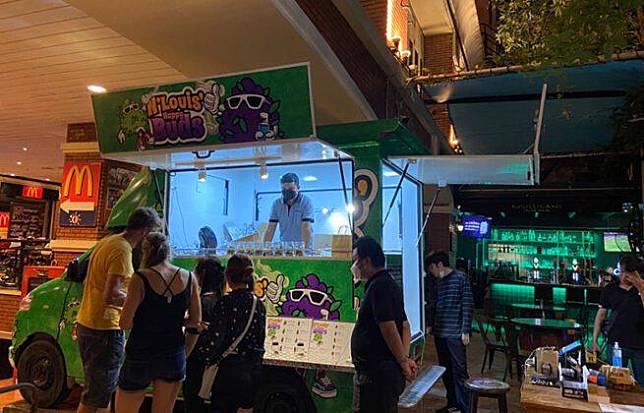 Green cannabis truck in Bangkok