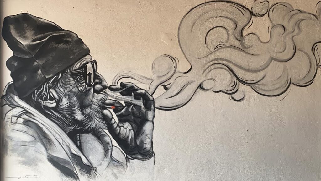 mural of man smoking