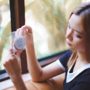 Woman in Thailand holding a cannabis edible