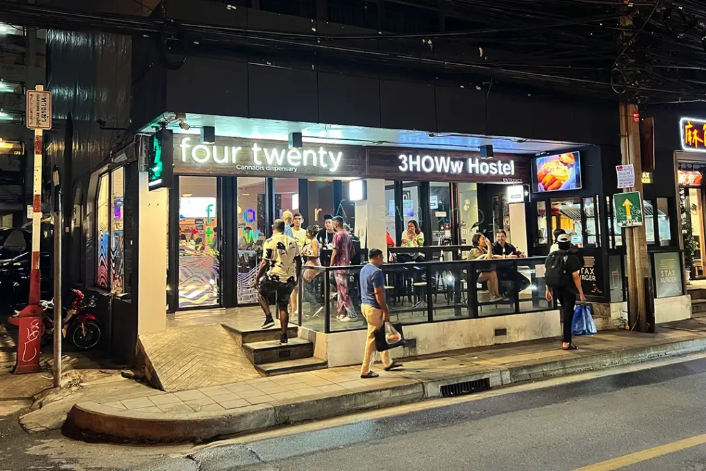Photo of a cannabis dispensary and hostel, with smoking area, in Bangkok from the outside