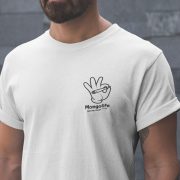 mongolife-hand-smoke-shirt Closeup of a man wearing a t-shirt of a cartoon hand holding a weed joint. T-shirt is from Mongolife.
